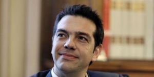 74591_leader-of-the-left-coalition-party-tsipras-smiles-dur.jpg