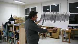 Eric Alibert montrant un dessin, Genève février 2008 [160