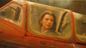 Milla-Jovovich-Resident-Evil-Afterlife-YAK-52-Cockpit.jpg