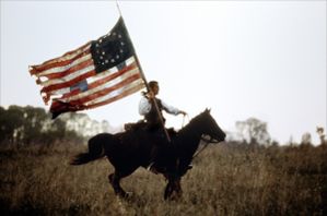 USA-patriot-gibson-riding-with-flag.jpg