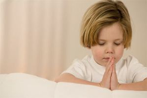 Enfant en prière.