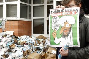 1597279_6_0c23_le-caricaturiste-luz-presente-la-une-de.jpg