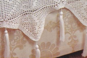 bordure à pompons