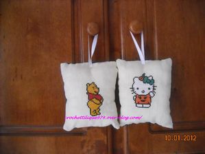 Winnie-l-ourson-et-hello-kitty-par-Tilique974.jpg