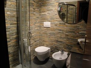 Pietra naturale e parquet ristrutturazioniparquetpietranaturaleroma Bagno parquet e mosaico