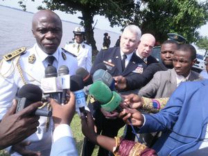 A Cameroonian Colonel (L) and Gen. Carter Ham (R) answer qu