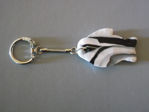 PTCLEI.M6/Porte Clé Ichtus Blanc/Noir 3€