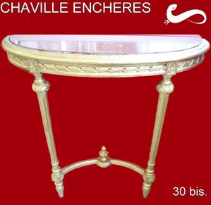 CHAVILLE ENCHERES Console en bois doré de style Louis XVI.