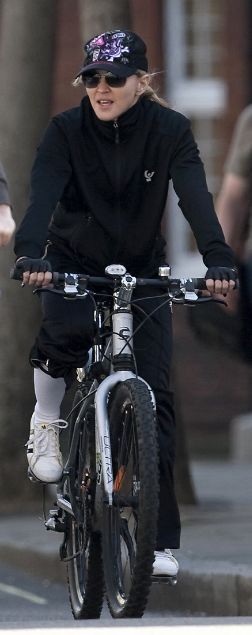The Queen Madonna riding her bike in London - April 9, 2011