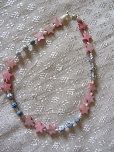 C etoile rose gris