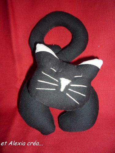 chat noir 2 oreilles blanches