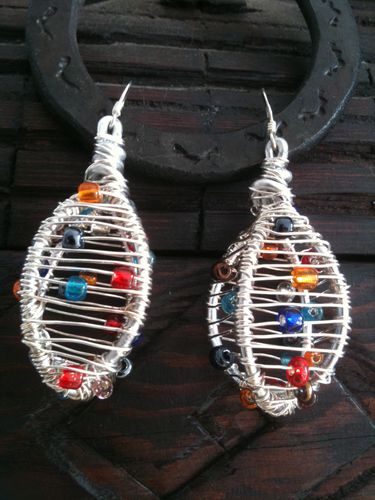 BOUCLES CAGE 007
