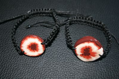 bracelets tressés avec rond blanc bruns tech cane oeil