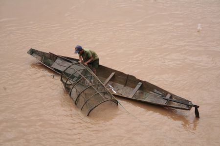 Un pecheur sur le Mekong
