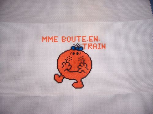 madame boute en train brodé par christelle