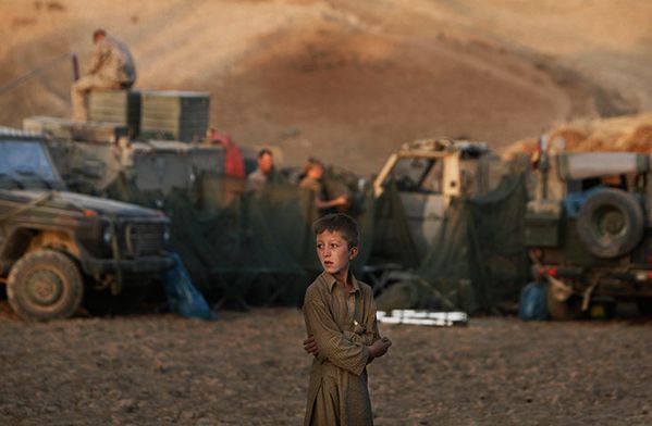 An-Afghan-boy-looks-on-as-001.jpg