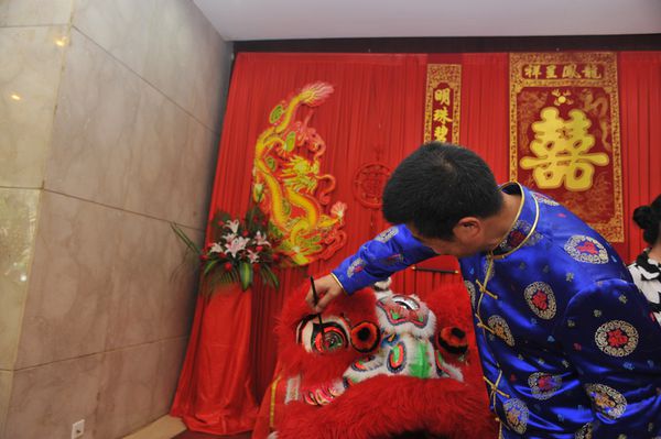 Chine - mariage chinois yeux des lions