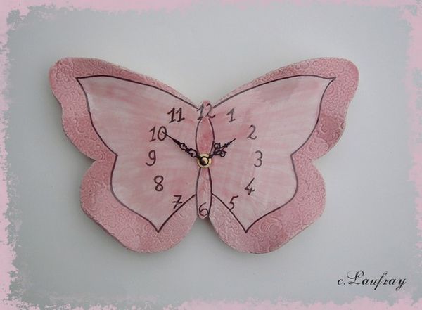 horloge papillon rose et noire