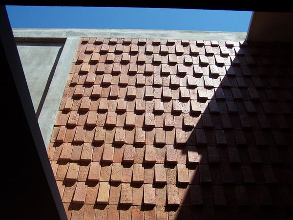 1294084976-red-brick-as-wall-decoration-photo-by-madcahyo