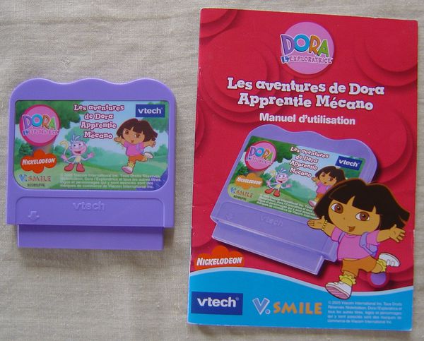 Lot de 2 jeux - V. Smile Motion - Mon Toutou tout fou ! - Les aventure de  Dora apprentie Mécano - 3-6 ans. Vtech - Label Emmaüs