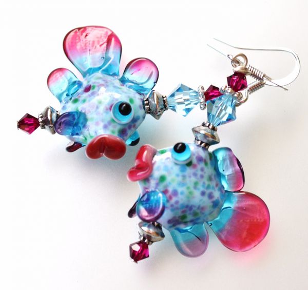 nage-nage-petit-poisson-boucles-