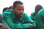 EX-KAGAME ESCORT TORTURED, THREATENED; US URGES FAIR TRIAL