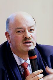 180px-Salon_du_livre_de_Paris_2011_-_Alain_Bauer_-_004.jpg