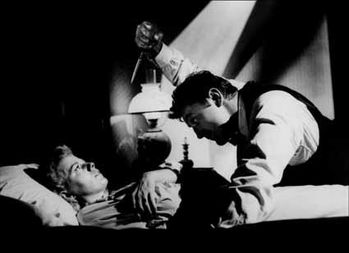 La nuit du chasseur - Shelley Winters et Robert Mi-copie-1
