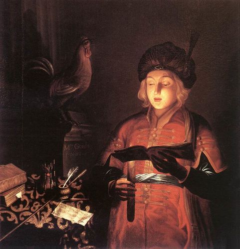 Jeune homme lisant à la chandelle