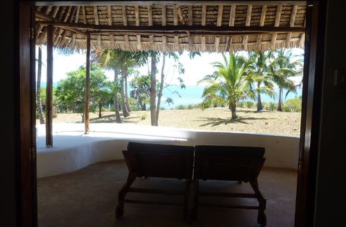 lounge chairs facing ocean