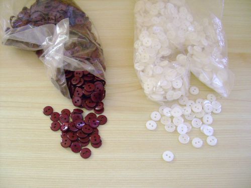 2 sachets de boutons