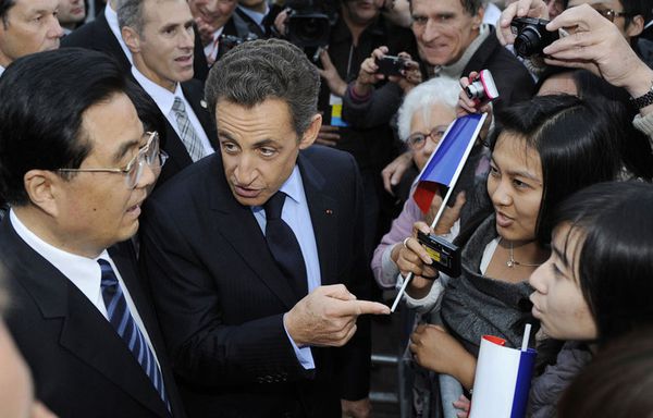sem89-Z36-Nicolas-Sarkozy-et-Hu-Jintao-sont-arrives-a-Nice.jpg