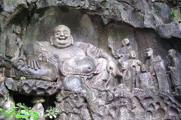 800px-Maitreya_and_disciples_carving_in_Feilai_Feng_Caves.jpg