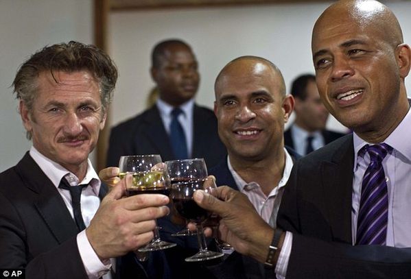 Sean-Penn-left-with-Haitis-President-Michel-Martelly-right-