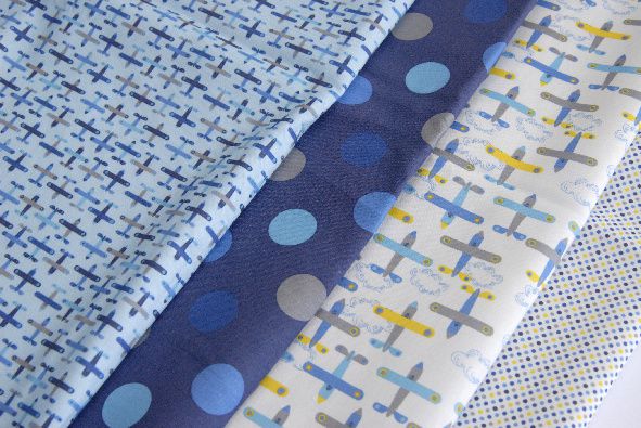 tissu motif petit avion bleu 1